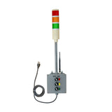 Industrial safety light tower with red, yellow, and green lights on a white background.