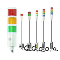 Set of industrial signal lights with red, yellow, and green colors on a white background.