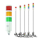 Collection of multicolored industrial signal lights with 2-position switches on a white background