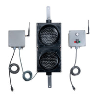 LED Traffic light system with connected receiver and separate switch box transmitter on a white background.