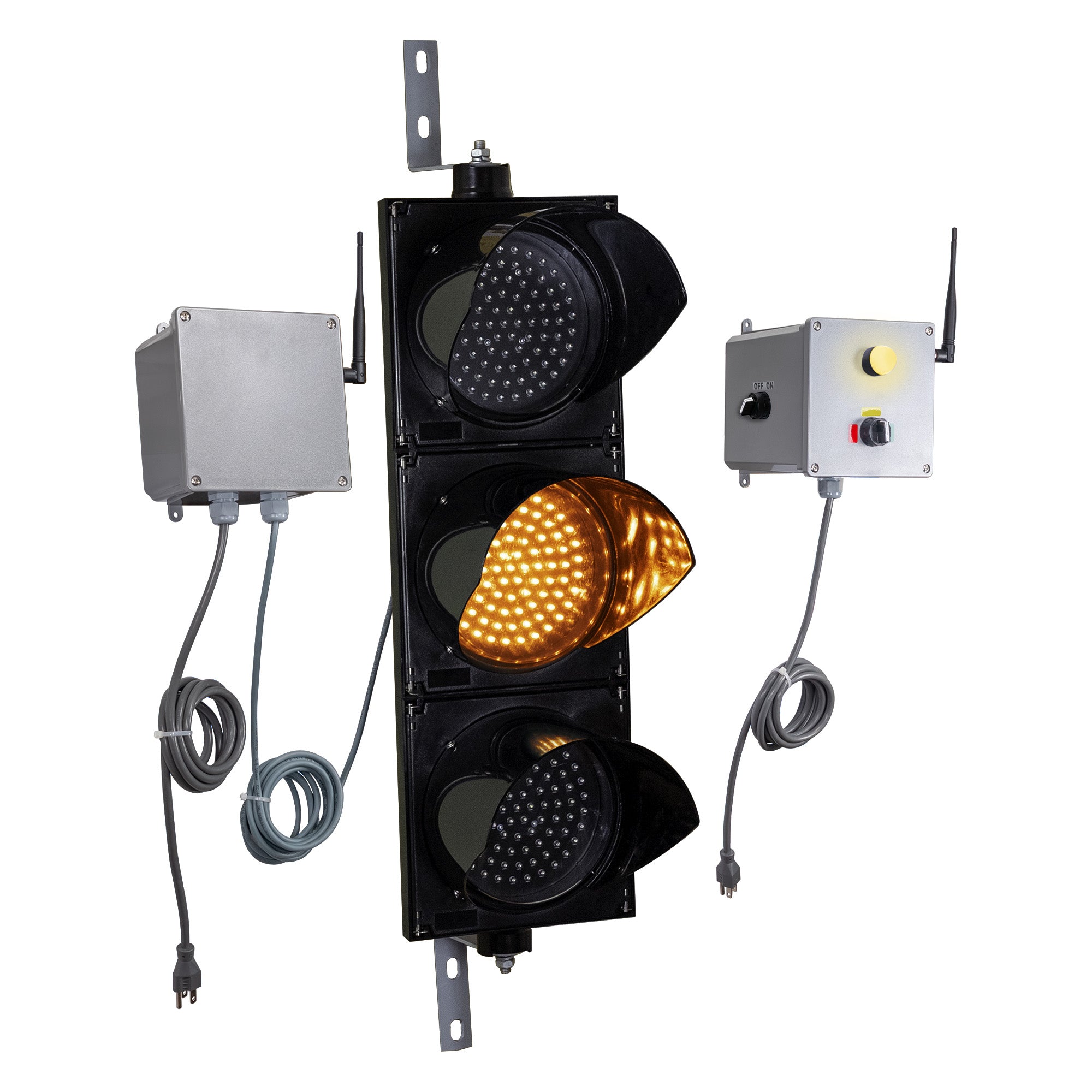 Angled perspective of a wireless traffic light system with amber LED light on and accompanying control box transmitter with mirrored pilot light and 3-position switch ton a white background.