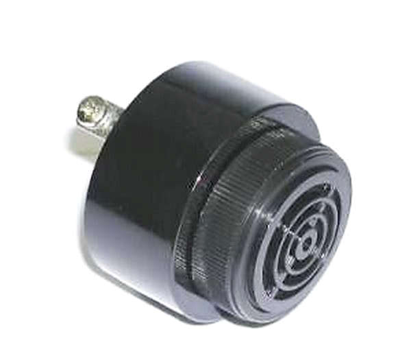 A black 30mm panel mount Piezo Resistive Audible Alarm with a threaded front nut and screw terminal connection.
