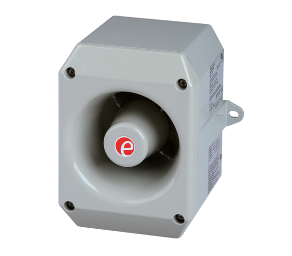 A gray metal industrial speaker with a red marking on the front.