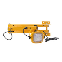 Yellow metal bracket with a light fixture on a white background.