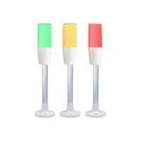 Diffused pole-mounted tower light on flange mount, demonstrating color options; Green-Amber-Red on white background.