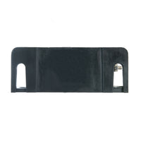 Bottom mounting points of plastic back up alarm on a white background.