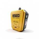 Corner traffic warning sensor with 'Caution When Flashing' label on a white background