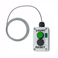 Control box with green button labeled 'Count' and 'Reset', and a cable on a white background.