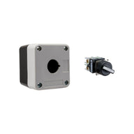 Grey and black single push button box held together by four phillips head screws next to a black and white 2-position selector switch on a white background.