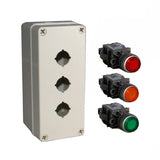 A 24V DC grey push button box kit with illuminating red, amber and green push buttons on a white background.