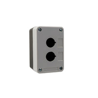 Grey front quarter perspective of a dual push button enclosure with two mounting holes and four phillips head screws holding the enclosure together on a white background.