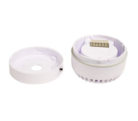 An opened up white audible alarm and designed for safety signage purposes.
