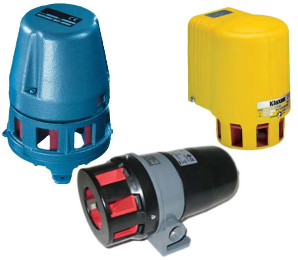 Three cylindrical motorized sirens in blue, yellow, and gray with red interior on a white background.