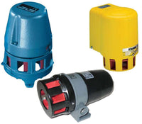 Three cylindrical motorized sirens in blue, yellow, and gray with red interior on a white background.