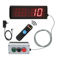 Digital display with red LED numbers, power adapter, remote control, and control box on a white background