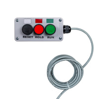 Control panel with three buttons labeled 'Reset', 'Hold', and 'Run' on a white background.