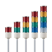 Collection of pole-mounted color-coded signal lights on white background