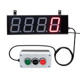 A digital LED production counter with a black display showing four digits and a red lit digit on the far right. Below the display is a control switch box with a green start and two red buttons.