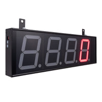 Front angled profile of a black 4 inch digital display with red illuminated letters on a white background.