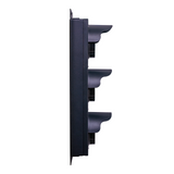 Side profile of a black triple-lens traffic light on a white background.