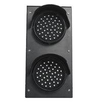 Front perspective of black aluminum traffic light powered off.