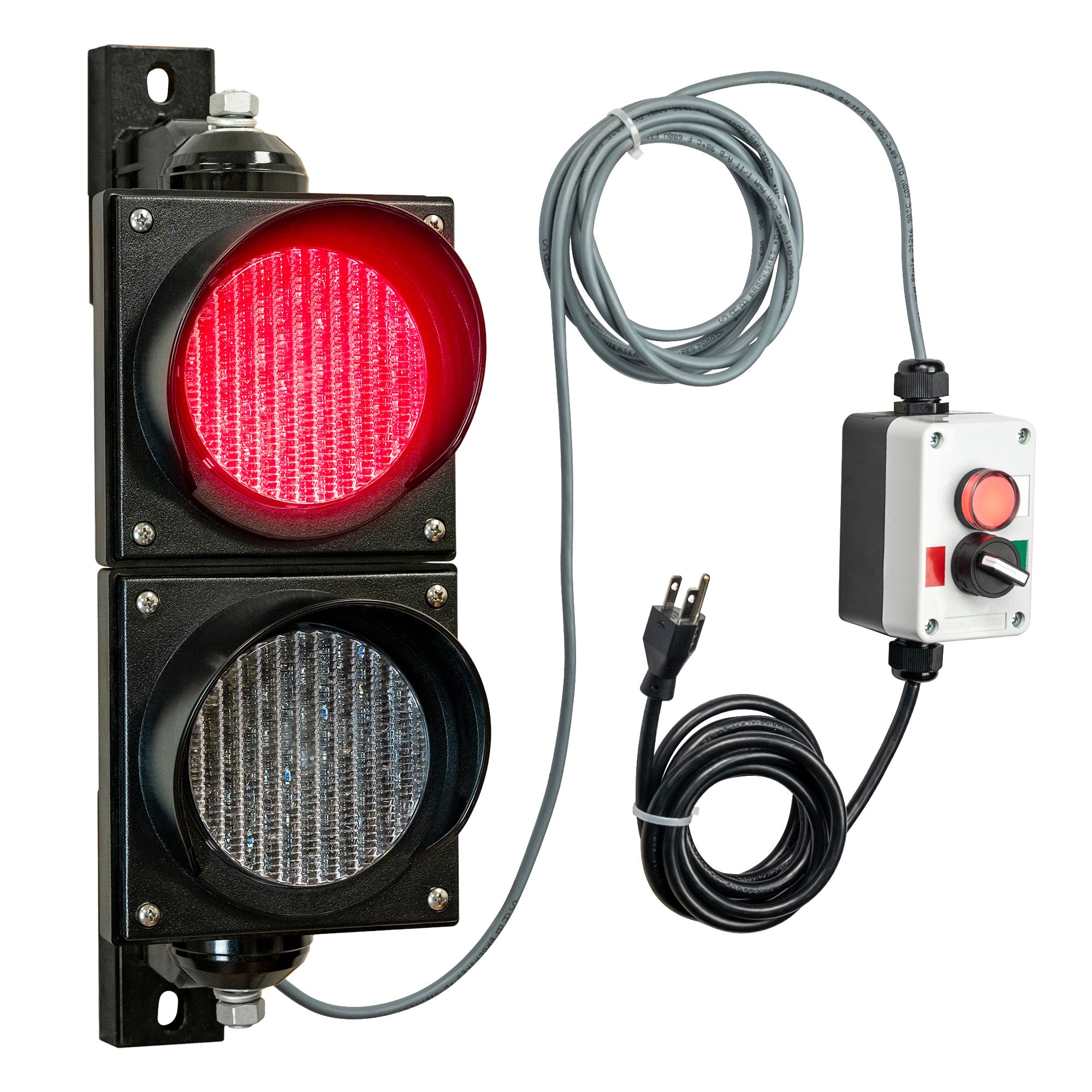 Red traffic light with a  pilot light control box and cables on a white background.