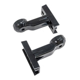 Two black plastic wall-mounted brackets on a white background.