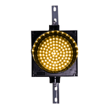 Amber 8 inch traffic light on a white background.